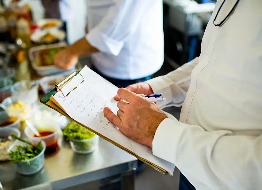 Printed operations manual and SOP documents for Tabla Franchise